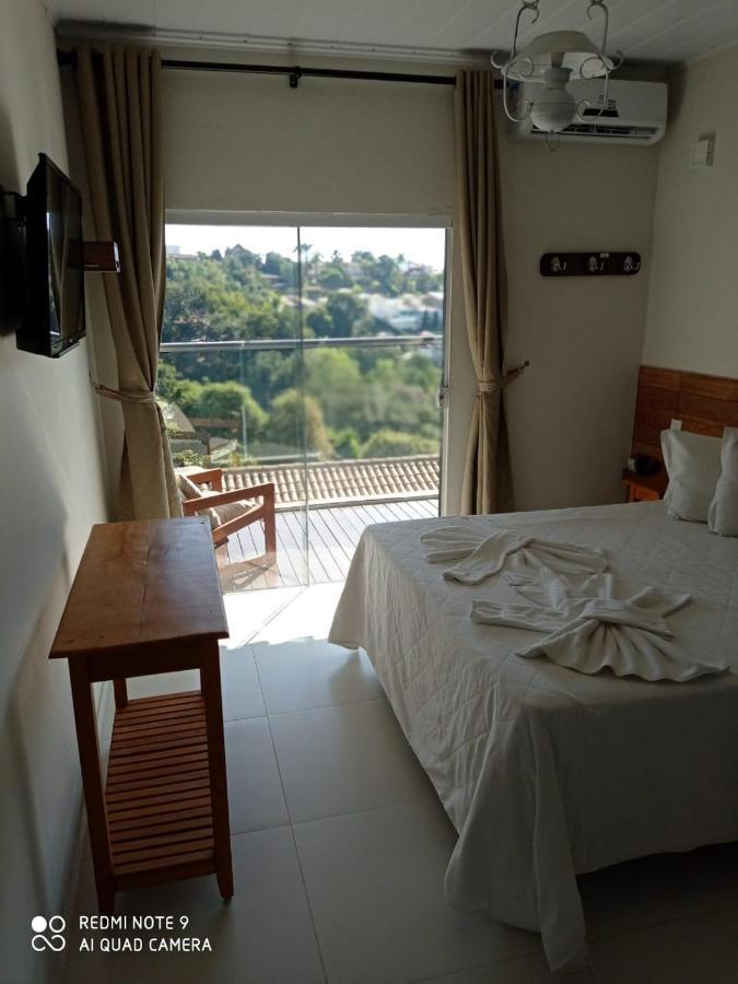 Hotel Escarpas Do Lago Capitolio Bagian luar foto
